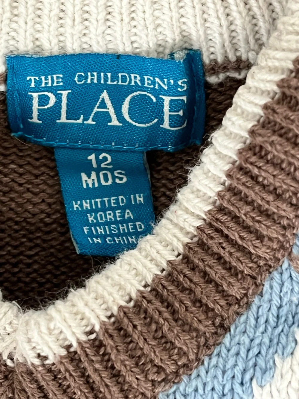 Place Brown Sleeveless Knit Vest with White Trim and Light Blue Accents
